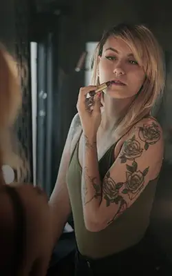 Tattoo of roses on a person's arm, showcasing floral art of henna tattoos